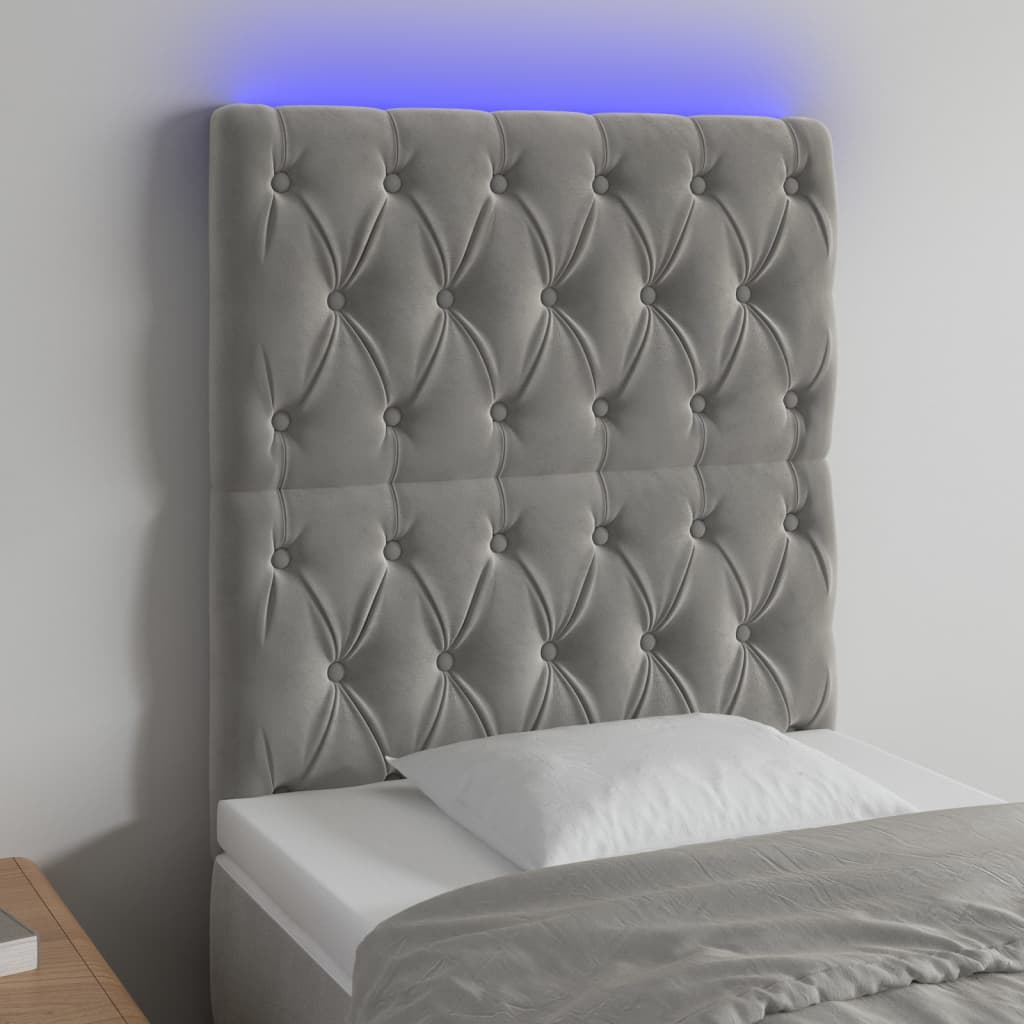 Sänggavel LED ljusgrå 80x7x118/128 cm sammet