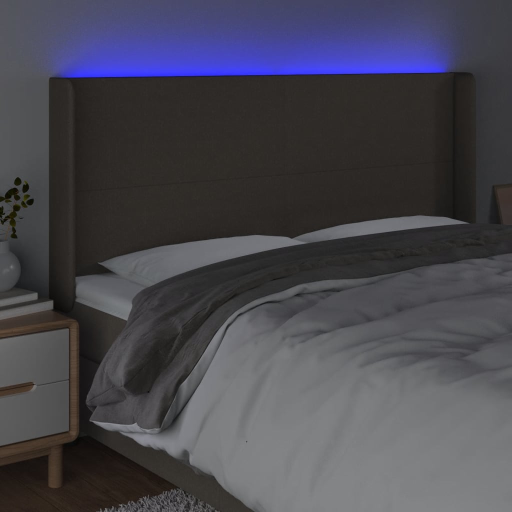 Sänggavel LED taupe 163x16x118/128 cm tyg