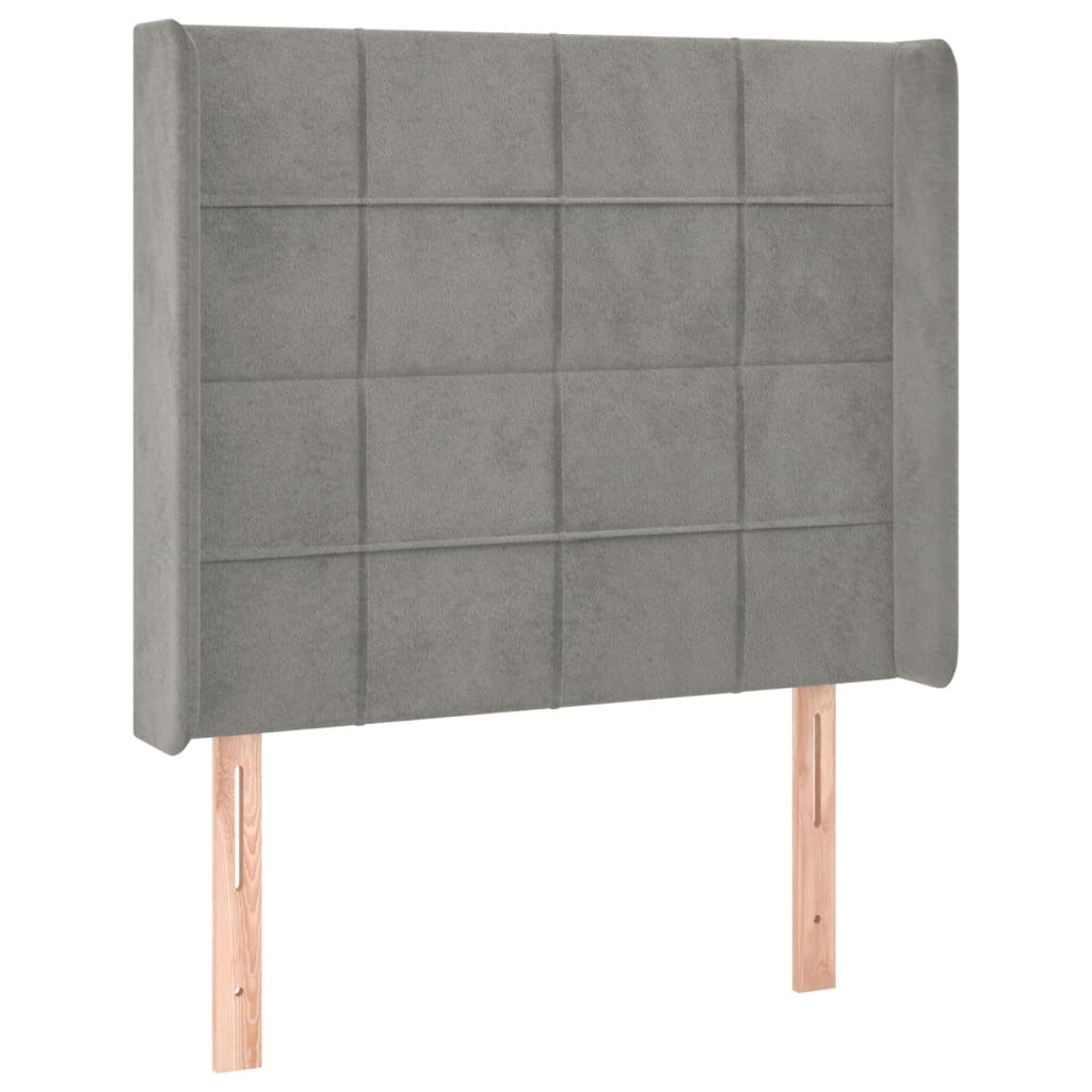 Sänggavel LED ljusgrå 83x16x118/128 cm sammet