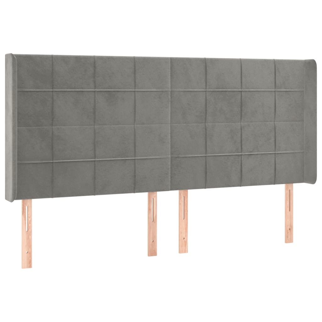 Sänggavel LED ljusgrå 163x16x118/128 cm sammet