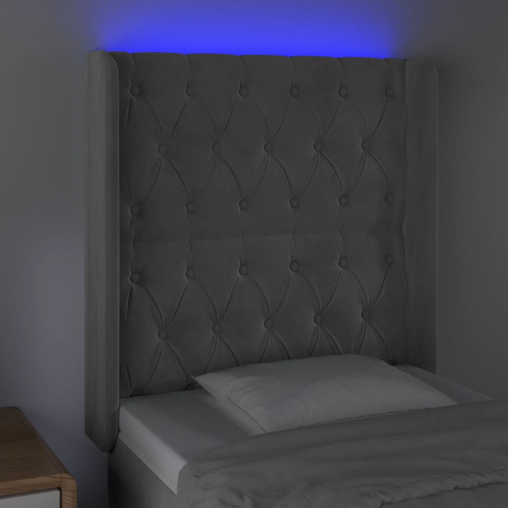 Sänggavel LED ljusgrå 83x16x118/128 cm sammet