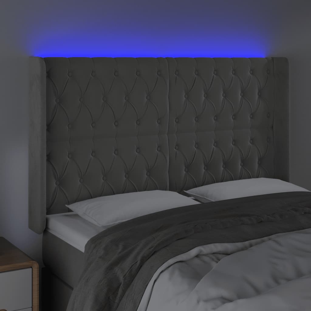 Sänggavel LED ljusgrå 163x16x118/128 cm sammet