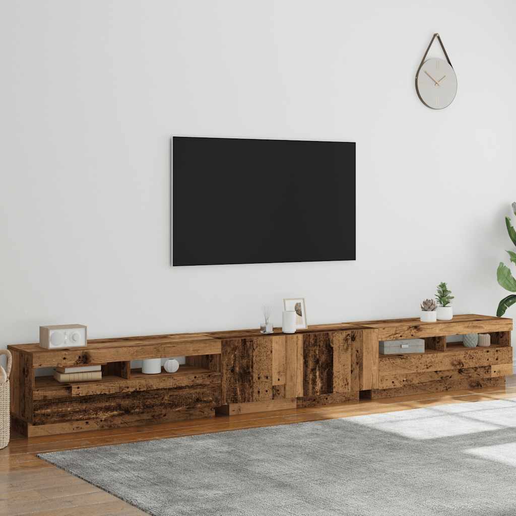 TV-bänk med LED-lampor åldrat trä 300x35x40 cm konstruerat trä